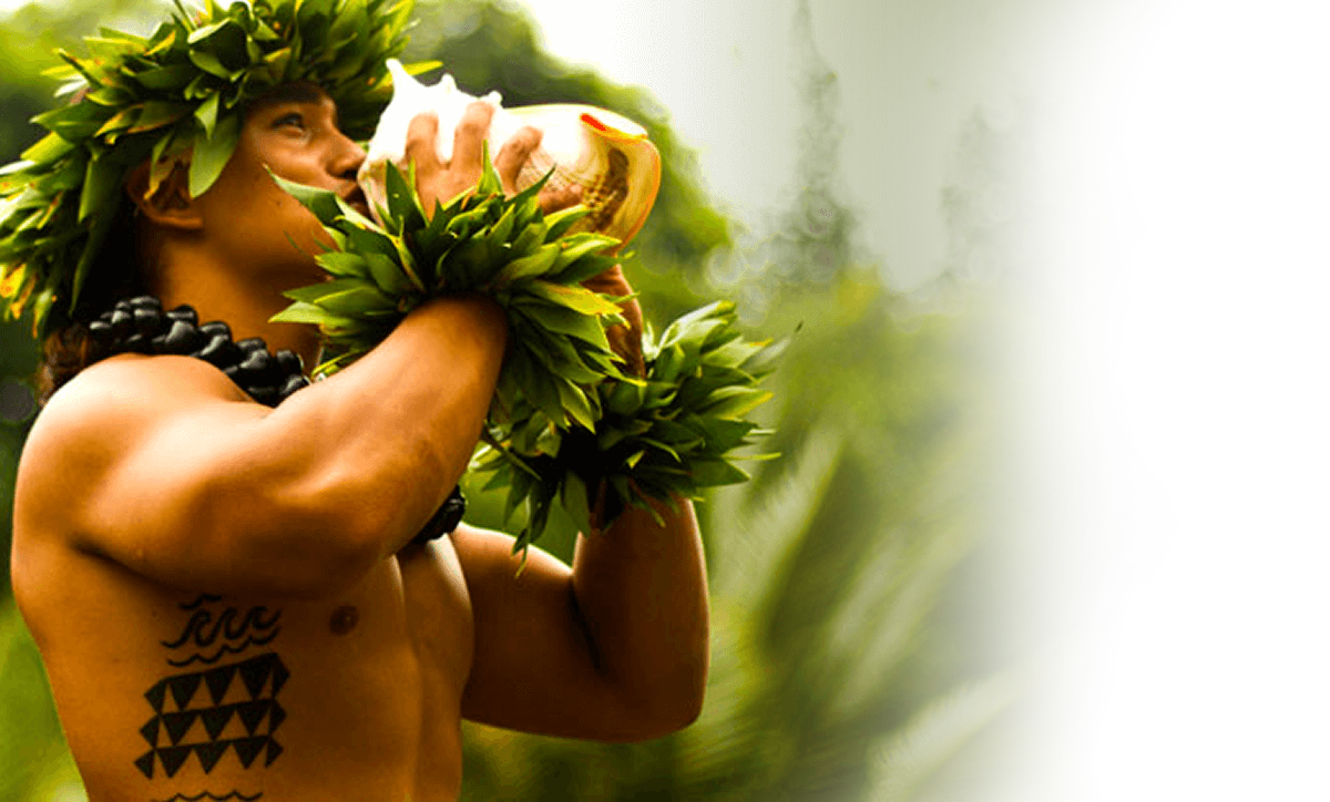 The original Island Breeze conch-shell performer wearing a leaf crown and lei